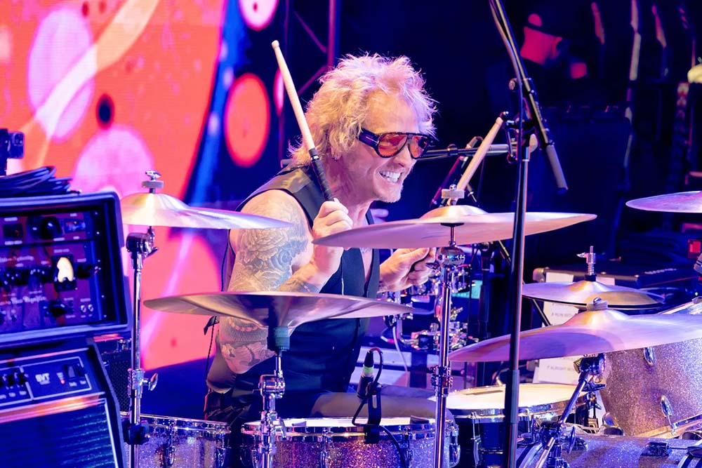 IMAGE SHOWING Matt Sorum – banging the drum for the kids.